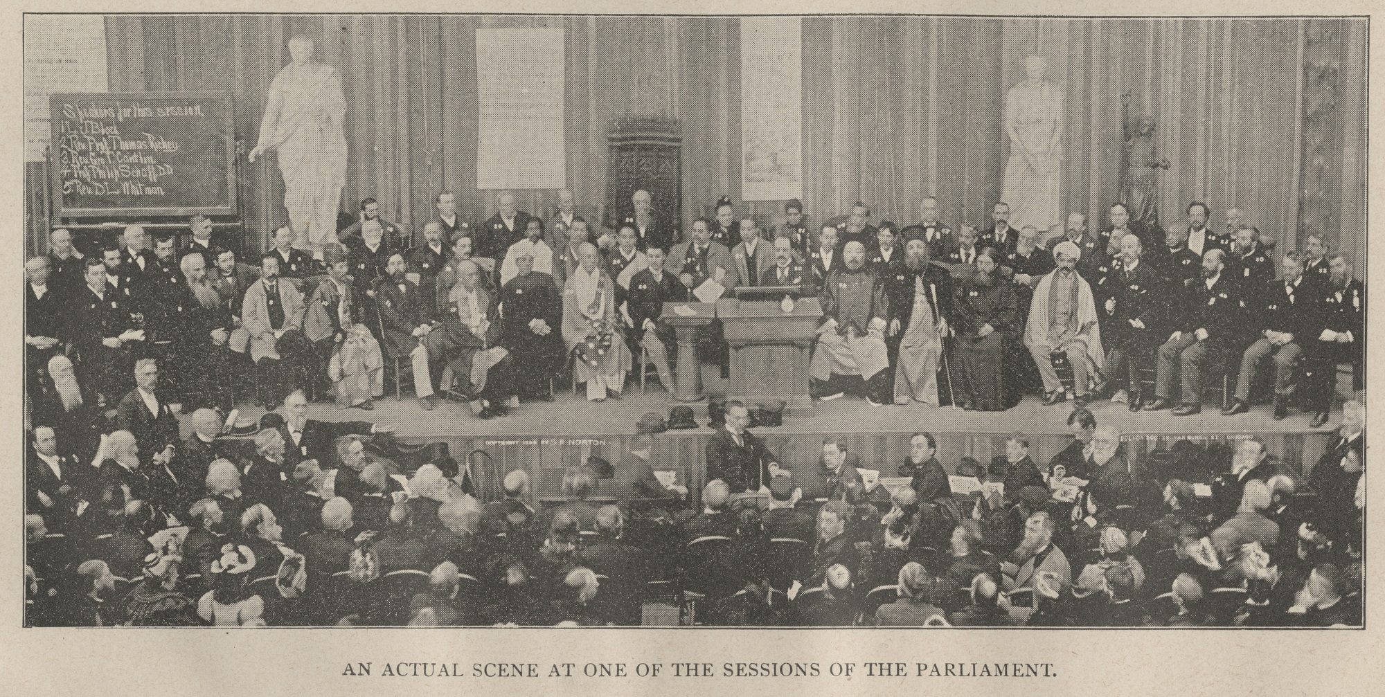 Group photo of scene at one of the sessions of the Parliament from the book The World's Parliament of Religions.